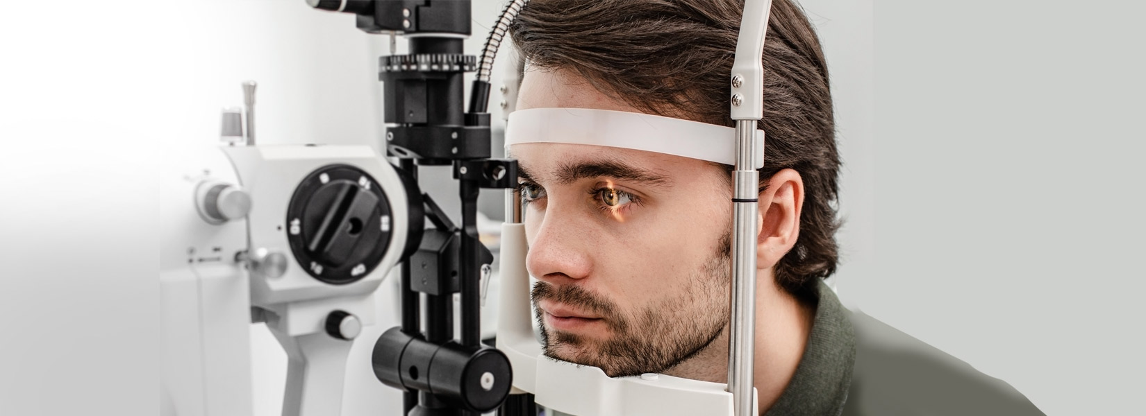 young man during eye exam in Cross Roads